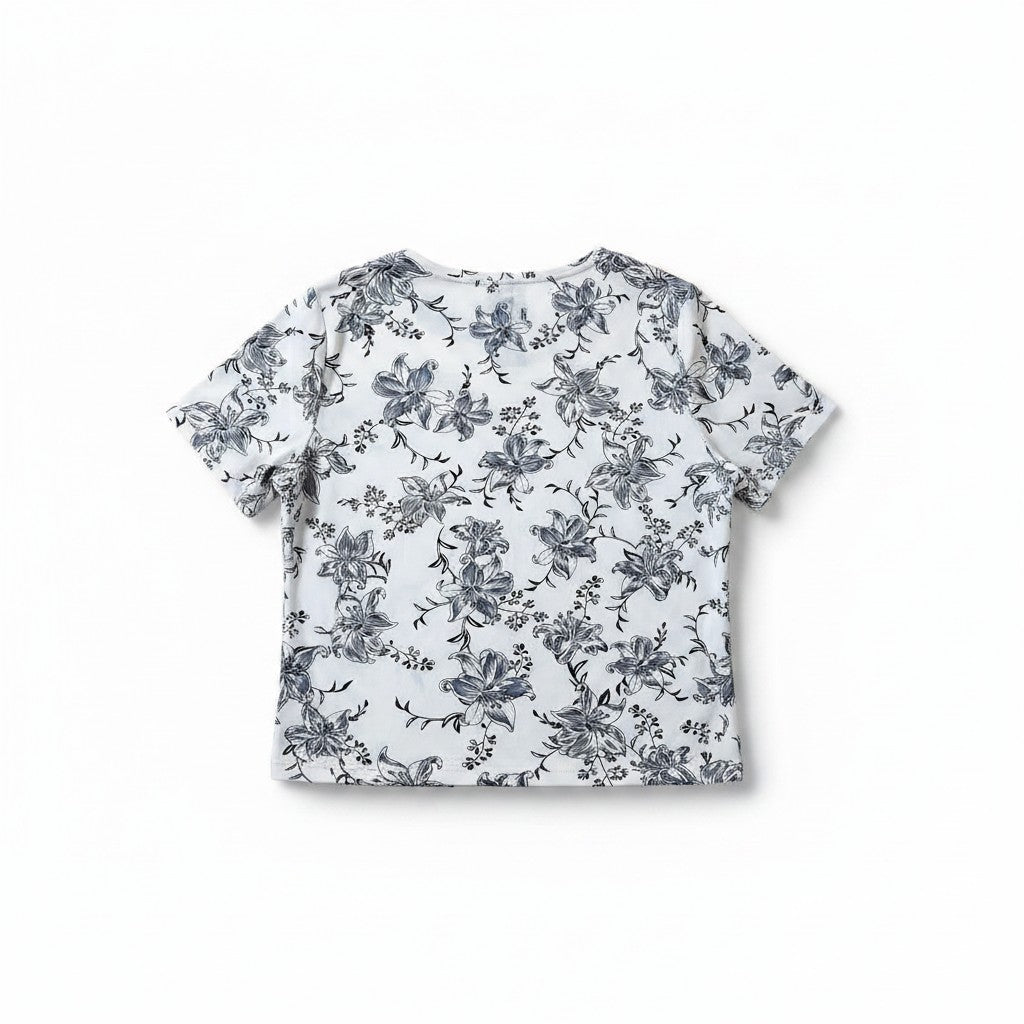 Bluză lejeră albă cu guler rotund și imprimeu floral fin negru